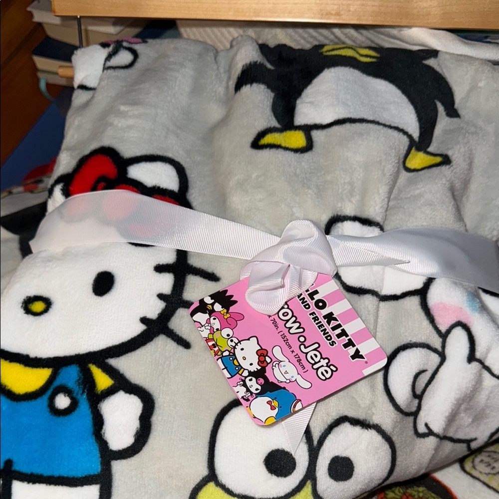 Hello Kitty and Friends Throw! Gray background.